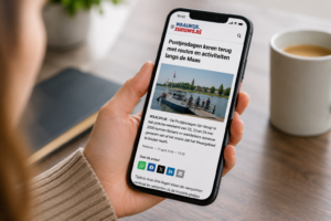 pontjesdagen nieuws - Stichting Bureau Toerisme - Stichting Bureau Toerisme Mobile screen shows a Dutch news article about Pontjesdagen returning with routes along the Maas, with a boat photo on the page.